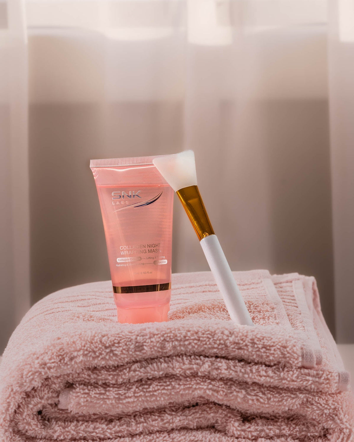 SNK Labs Collagen Night Wrapping Mask and applicator brush, an overnight hydrating treatment