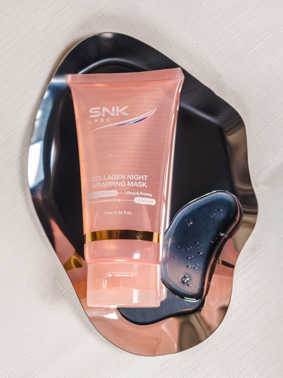 SNK Labs Collagen Night Wrapping Mask presented on a silver plate